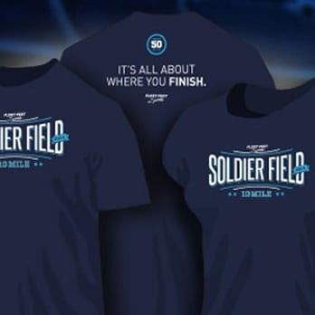 Soldier Field - The 2014 shirt was a navy technical shirt. For woman, it was fitted. I really liked the design: simple and understated! - Stadiums & Arenas Near Me - Chicago, Illinois Soldier Field - The 2014 shirt was a navy technical shirt. For woman, it was fitted. I really liked the design: simple and understated! - Stadiums & Arenas Near Me - Chicago, Illinois