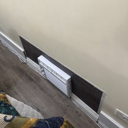 Santa Paula Inn - air conditioner at floor -we couldn't even see the settings!  We are seniors-bending down to read the small settings was very difficult.
