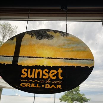 Sunset On the Water - a sign hanging from a window - Steakhouses Near Me - Fond du Lac, Wisconsin Sunset On the Water - a sign hanging from a window - Steakhouses Near Me - Fond du Lac, Wisconsin