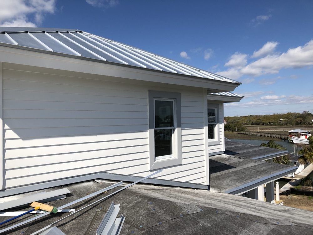 Slide of Canaan roofing and gutters