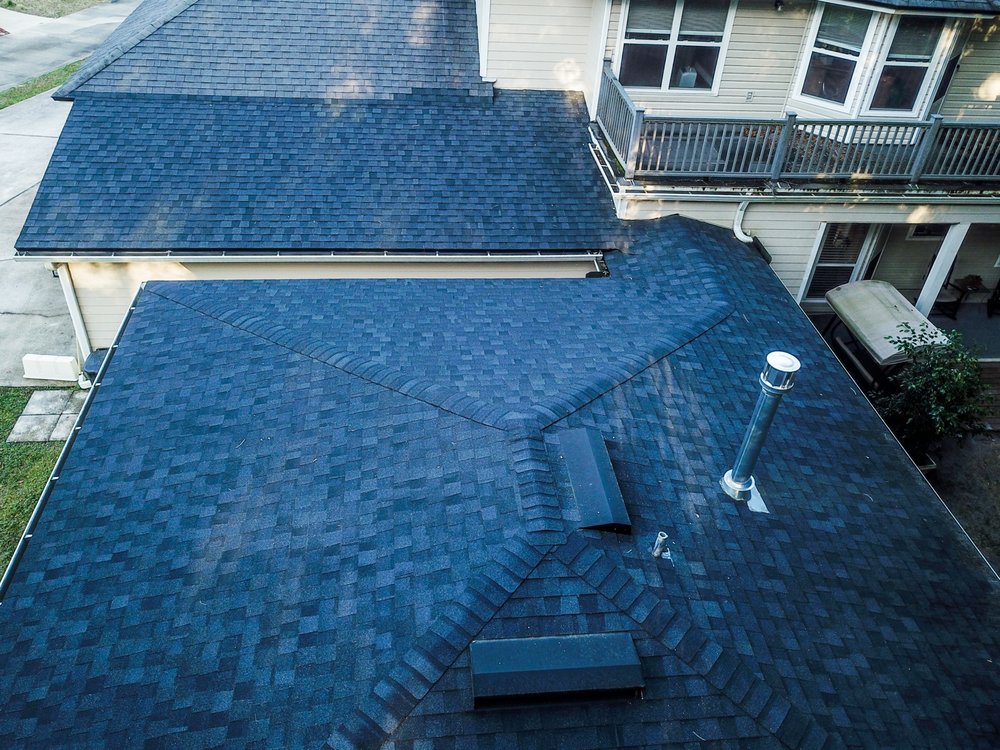 Slide of Action Roofing