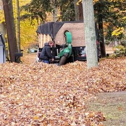 Top Notch Property Maintenance Services - Hauling away leaves with our fall cleans!