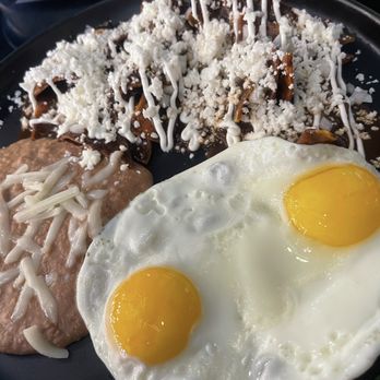 Laurel & Tle - Chilaquiles De Mole, with sunny side up eggs - Mexican Near Me - Los Angeles, California