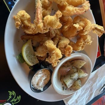 Chuck's Seafood Restaurant - Famous fried shrimp with 2 sides (lettuce salad and veggies) - Seafood Near Me - Fort Pierce, Florida