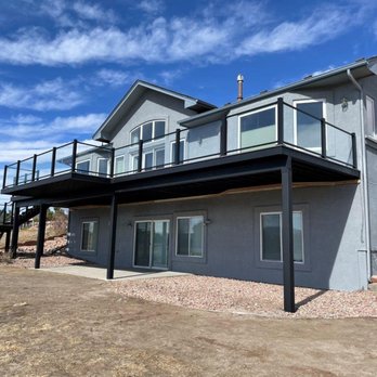 Stonecroft Construction - Steel Frame Composite Deck with Glass Railing in Colorado Springs. - Decks & Railing Near Me - Colorado Springs, Colorado Stonecroft Construction - Steel Frame Composite Deck with Glass Railing in Colorado Springs. - Decks & Railing Near Me - Colorado Springs, Colorado