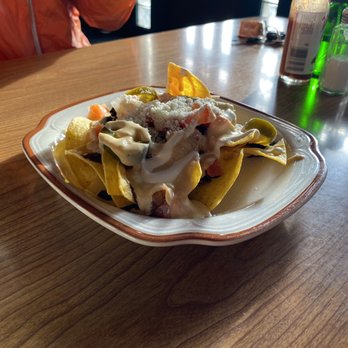 Buho - Half order of nachos has 10 chips in it. This cost $8 - Mexican Near Me - Seattle, Washington Buho - Half order of nachos has 10 chips in it. This cost $8 - Mexican Near Me - Seattle, Washington