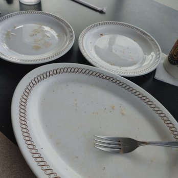 Waffle House - empty plates and a fork on a table - American Near Me - Savannah, Georgia Waffle House - empty plates and a fork on a table - American Near Me - Savannah, Georgia