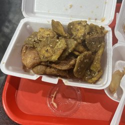 China PR - Pork chops and tostones