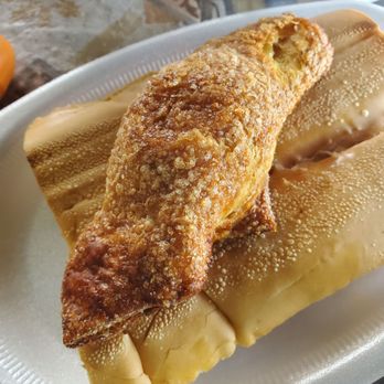 Karla Bakery - Pastelito de Queso (cheese pastry) on top of a Tostada (pressed cuban bread with butter) - Bakeries Near Me - Miami, Florida Karla Bakery - Pastelito de Queso (cheese pastry) on top of a Tostada (pressed cuban bread with butter) - Bakeries Near Me - Miami, Florida