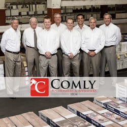 Comly Auctioneers & Appraisers - The Comly team at our auction warehouse.