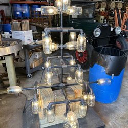 Walton's Distillery - Chandelier about to get hung.