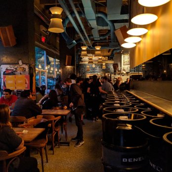 Benelux - people sitting at tables in a restaurant - Bars Near Me - Montreal, Quebec