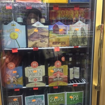 Beer & Smoke - a display of various types of beer - Beer, Wine & Spirits Near Me - Astoria, New York Beer & Smoke - a display of various types of beer - Beer, Wine & Spirits Near Me - Astoria, New York
