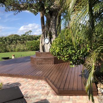 Kisto Maintenance - This is a wood deck built from scratch sand and spray and paint to give it that brown look - Handyman Near Me