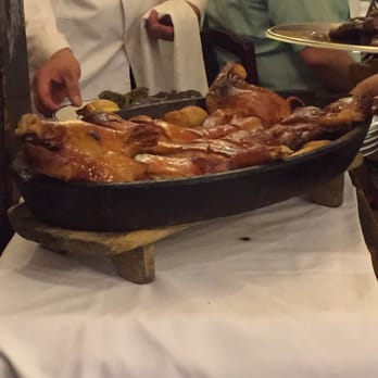 Botín - The table next to us got the whole piggy. - Spanish Near Me - Madrid, M