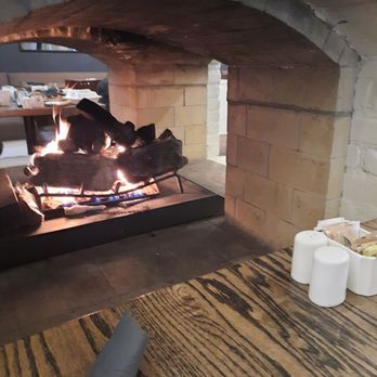 The Pottery Restaurant - Seating by fireplace - Canadian (New) Near Me - Blue Mountains, Ontario The Pottery Restaurant - Seating by fireplace - Canadian (New) Near Me - Blue Mountains, Ontario