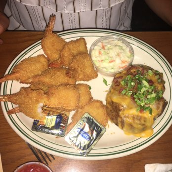 Clementine's - Shrimp with loaded baked potato and coleslaw. - American Near Me - South Haven, Michigan