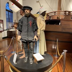 St Augustine Visitor Information Center - Love seeing displays like this! You can really imagine what life was life by their clothing and other artifacts and a portion of the boat!