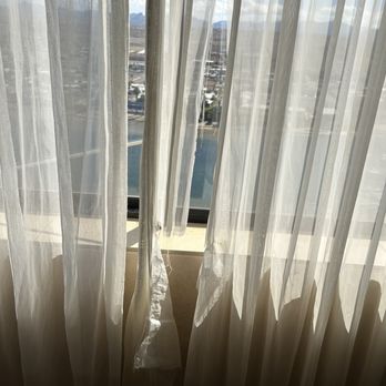 Harrah's Laughlin - A Caesars Rewards Destination - Torn drapes. - Hotels Near Me - Laughlin, Nevada Harrah's Laughlin - A Caesars Rewards Destination - Torn drapes. - Hotels Near Me - Laughlin, Nevada