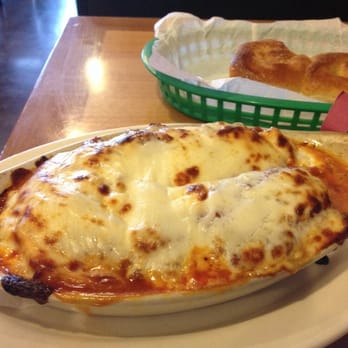 Napoli's Pizza & Restaurant | East Plano, TX - I was so eager to cut into the cheese, I had to stop and take a picture midway thru! - Pizza Near Me - Plano, Texas