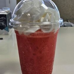 Soda Blitz - The "Princess Peach" drink: red cream soda with peach puree and whipped cream.