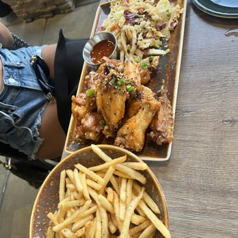 Reunion Kitchen + Drink - Reunion Spicy Wings and fries - New American Near Me - Corona, California