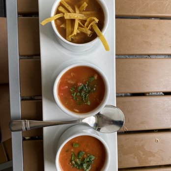 Rick's On Main - Soup Sampler (chicken tortilla, Manhattan clam chowder, tomato basil) - New American Near Me - East Aurora, New York Rick's On Main - Soup Sampler (chicken tortilla, Manhattan clam chowder, tomato basil) - New American Near Me - East Aurora, New York