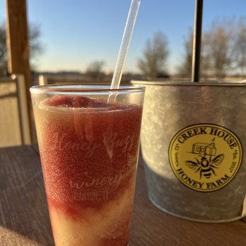 Honey Buzz Winery - a glass of watermelon and a bucket of strawberries - Salad Near Me - Canyon, Texas