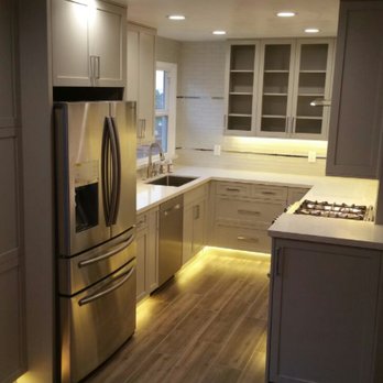 Superb Builders - a kitchen with stainless steel appliances - General Contractors Near Me - Los Angeles, California Superb Builders - a kitchen with stainless steel appliances - General Contractors Near Me - Los Angeles, California