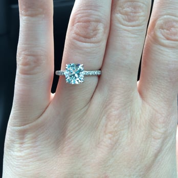 Brilliantly Engaged - Cushion cut diamond in a platinum pavé setting. - Jewelry Near Me - New York City, New York Brilliantly Engaged - Cushion cut diamond in a platinum pavé setting. - Jewelry Near Me - New York City, New York
