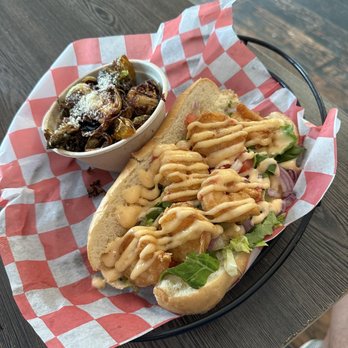 Twisted Shrimp - Shrimp Poor Boy sandwich with a side of killer Brussels sprouts! - Seafood Near Me - Islamorada, Florida Twisted Shrimp - Shrimp Poor Boy sandwich with a side of killer Brussels sprouts! - Seafood Near Me - Islamorada, Florida
