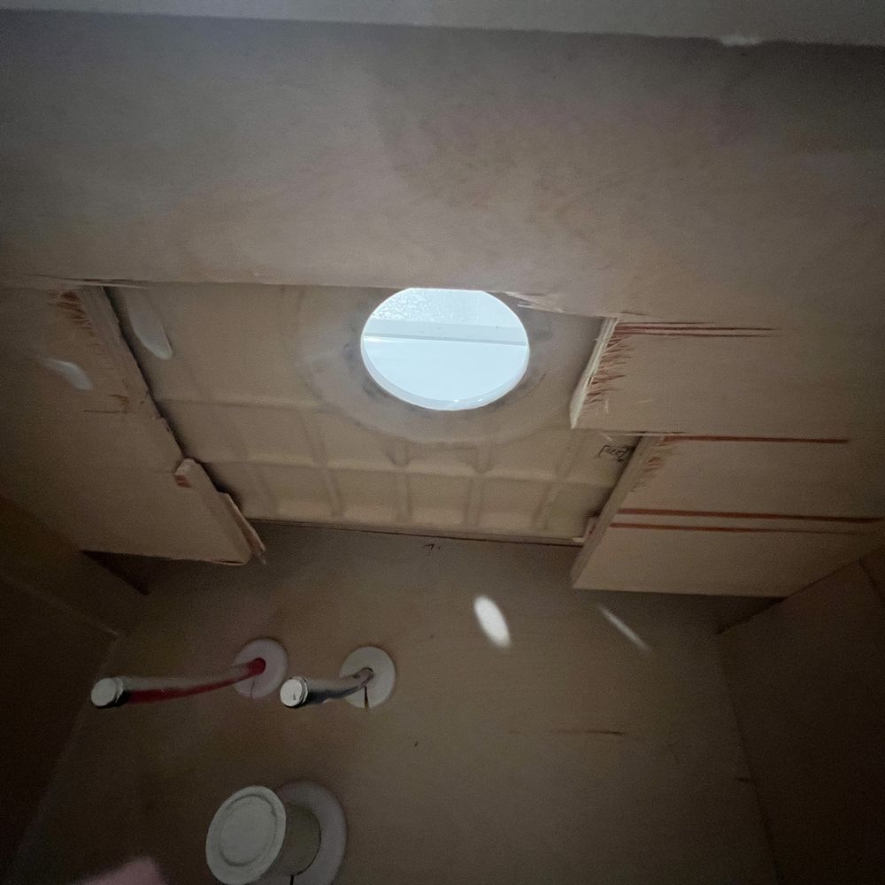 Damage to the wood panel under sink