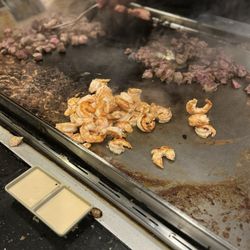 Little Tokyo - Our chef cooking the meat for our meals.