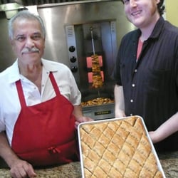 Taiim Falafel Shack - Taiim's friendly chef and manager show of their baklava... where else can you get dessert for $3?