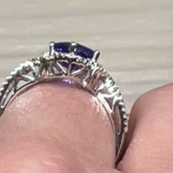 Curtis Cox Jewlers - Beautiful tanzanite and diamond ring side view with great detail to add extra beauty to the ring