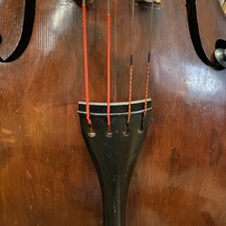 The Acoustic Bass Shop - 1950's Framus bass with repaired crack to right of tailpiece.