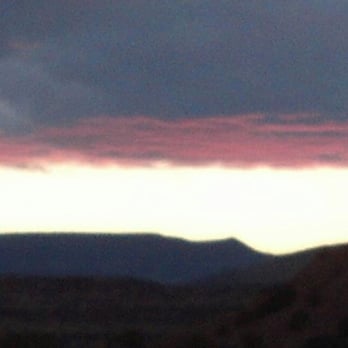 Ghost Ranch - Sunset under Clouds at Ghost Ranch - Museums Near Me - Abiquiu, New Mexico