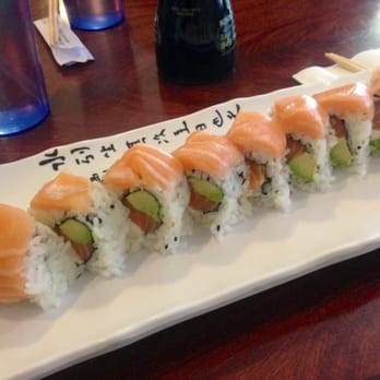 Kokoro Sushi - Niriko's Roll comes with salmon, crab, avocado and cream cheese and another outer later of salmon - Sushi Bars Near Me - Salinas, California Kokoro Sushi - Niriko's Roll comes with salmon, crab, avocado and cream cheese and another outer later of salmon - Sushi Bars Near Me - Salinas, California