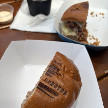 Beach Bum Burgers - Burger with added sausage patty. So good. They cut it in half for us. Beers from Eppig - Burgers Near Me - San Diego, California Beach Bum Burgers - Burger with added sausage patty. So good. They cut it in half for us. Beers from Eppig - Burgers Near Me - San Diego, California