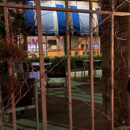 This location desperately needs a barrier between those dining outside and the cars sitting in the drive-through This location desperately needs a barrier between those dining outside and the cars sitting in the drive-through
