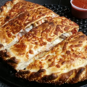 Stackers Pizzeria - Sausage pepperoni ham and onion Calzone - Pizza Near Me - Saratoga, California Stackers Pizzeria - Sausage pepperoni ham and onion Calzone - Pizza Near Me - Saratoga, California