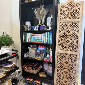 Barakah Coffee House - Bookshelf of books and games - Coffee & Tea Near Me - San Diego, California