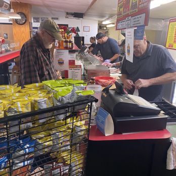 Celebrity's Hotdogs - customers at the counter - Hot Dogs Near Me - Asheville, North Carolina Celebrity's Hotdogs - customers at the counter - Hot Dogs Near Me - Asheville, North Carolina