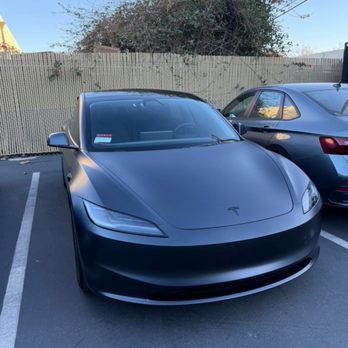Electric Auto Films - Irvine - XPEL PPF stealth wrap on a stealth grey Tesla model 3. 20% Rayno S9 ceramic tint on all side and back windows, and Satin black decals. - Car Window Tinting Near Me - Irvine, California Electric Auto Films - Irvine - XPEL PPF stealth wrap on a stealth grey Tesla model 3. 20% Rayno S9 ceramic tint on all side and back windows, and Satin black decals. - Car Window Tinting Near Me - Irvine, California