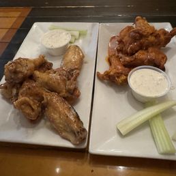 Honey mustard (left) and buffalo wings. Crispy, but not served hot. C* blue cheese. Honey mustard (left) and buffalo wings. Crispy, but not served hot. C* blue cheese.