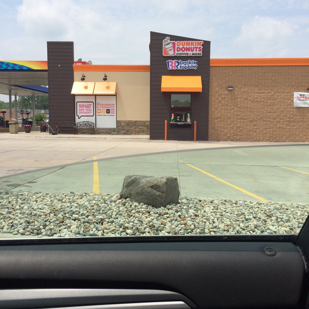  a rock in a parking lot