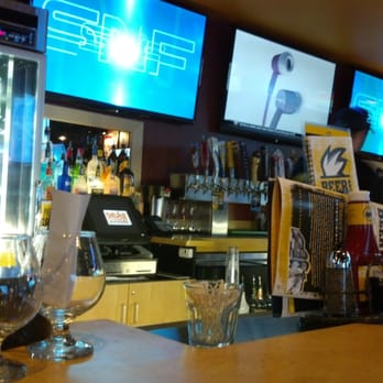 Buffalo Wild Wings - This place will stomp a MUDHOLE (metaphorically speaking) in Wild(ly Rude) Bill's (w/pig trough food.) - Sports Bars Near Me - Blaine, Minnesota Buffalo Wild Wings - This place will stomp a MUDHOLE (metaphorically speaking) in Wild(ly Rude) Bill's (w/pig trough food.) - Sports Bars Near Me - Blaine, Minnesota