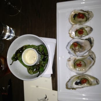 Swift's Attic - Seared Shishito peppers and oysters on a half shell - New American Near Me - Austin, Texas