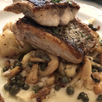 Petit Louis Bistro - Rockfish entree - French Near Me - Baltimore, Maryland Petit Louis Bistro - Rockfish entree - French Near Me - Baltimore, Maryland