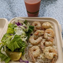 Garlic plate with greens paired with a strawberry and banana shake Garlic plate with greens paired with a strawberry and banana shake